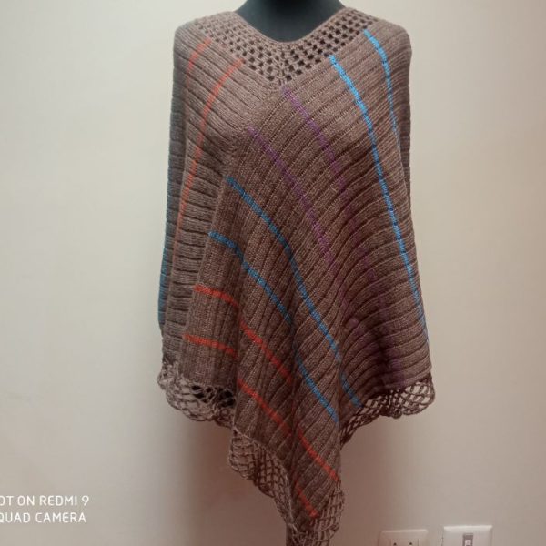 Poncho, terminado a mano